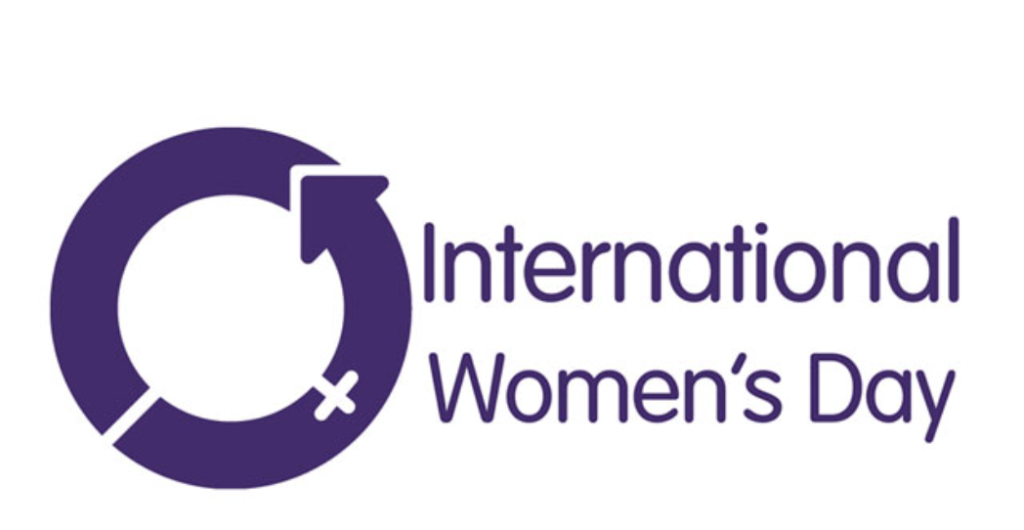 A sign saying International Women's Day on a white background