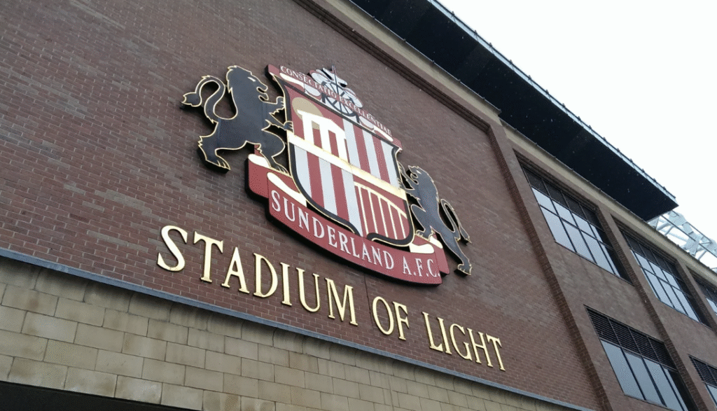 Words say 'Stadium of Light' next to Sunderland AFC's logo on the side of their ground